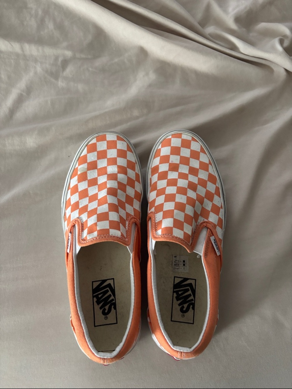Vans Orange and White Checkerboard Slip-On Sneakers